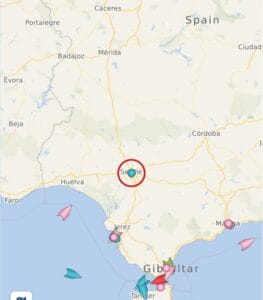 Map of southern Spain shows Seville way in from the coast, with a red circle around it showing the location of our ship.